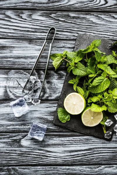 Top View Ingredients Making Mojito Ice Cubes Tongs Wooden Surface — Free Stock Photo