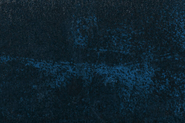 dark blue aged rusty metal textured background 