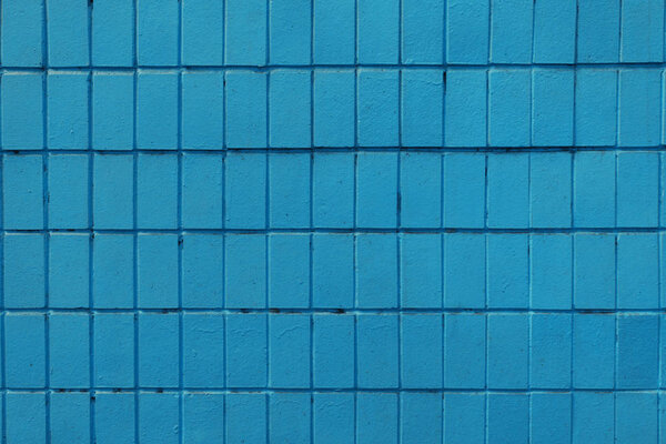 blue wall with old bricks, full frame background      
