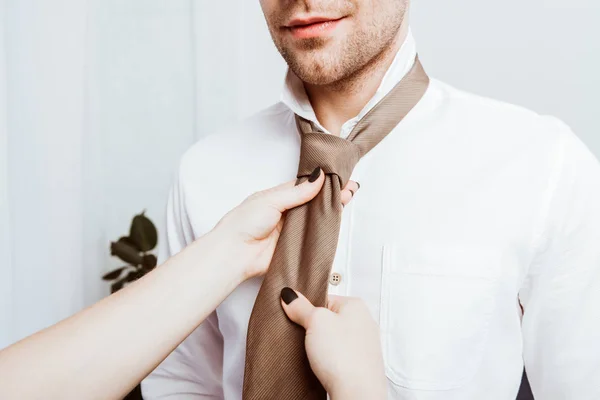 Cropped Image Woman Tying Neck Tie Boyfriend White Shirt Home — Stock Photo, Image