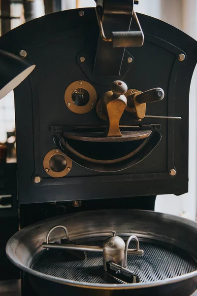 Adjusting handles of machine for professional coffee production — Stock Photo