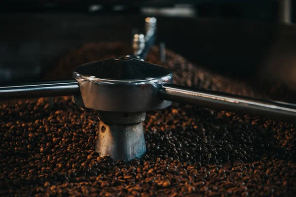 Traditional coffee roaster cooling of fresh roasted coffee beans — Stock Photo