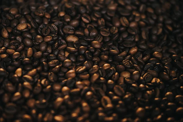 Texture of coffee beans in process of roasting — Stock Photo