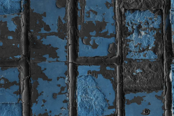 Vue rapprochée de vieux murs de briques bleues altérés avec fissures — Photo de stock