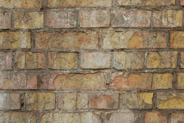 Vieux fond de mur de brique altérée — Photo de stock