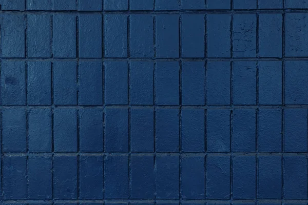 Dark blue wall with old bricks, full frame background — Stock Photo