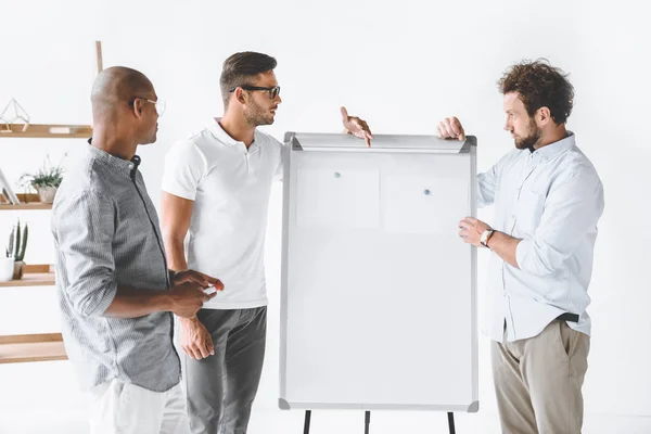 Multicultural Business People Discussing New Business Strategy White Board Office Stock Image