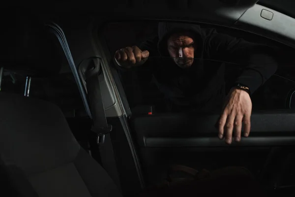 Serious Male Thief Black Hoodie Stealing Bag Car — Stock Photo, Image