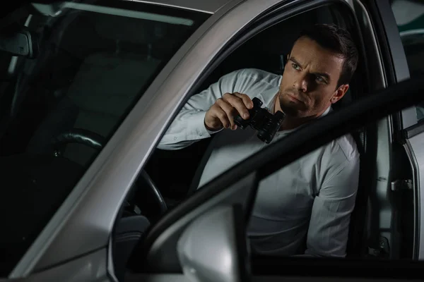 Focused Undercover Male Agent Doing Surveillance Binoculars His Car — Stock Photo, Image