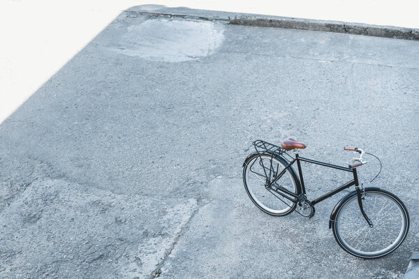 high angle view of one bicycle on street in city