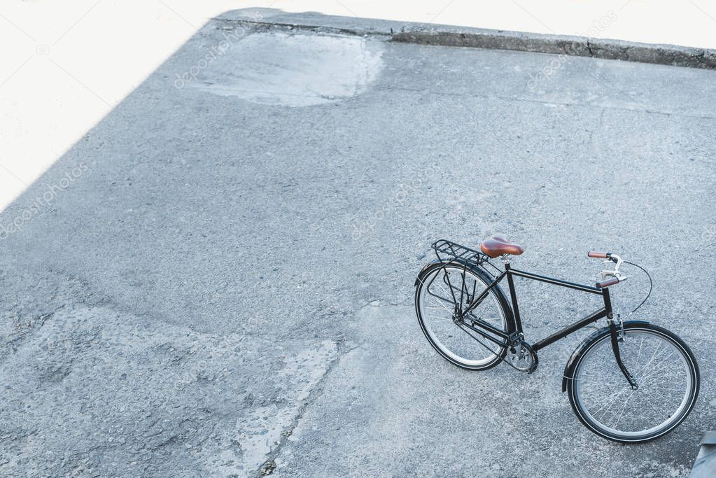 High angle view of one bicycle on street in city