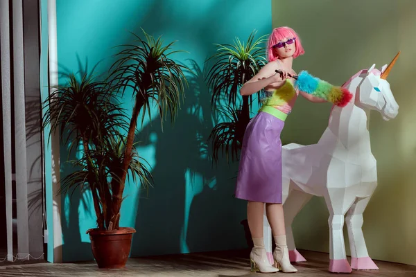 Stylish Girl Pink Wig Holding Duster Standing Neat Unicorn — Stock Photo, Image