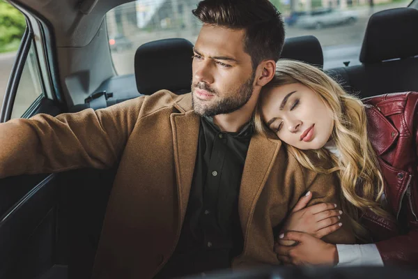 Young Man Looking Car Window While Girlfriend Sleeping His Shoulder — Stock Photo, Image
