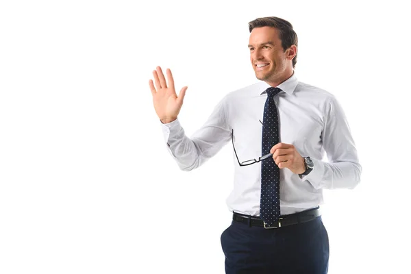 Homem Negócios Sorrindo Segurando Óculos Acenando Mão Isolada Fundo Branco — Fotografia de Stock