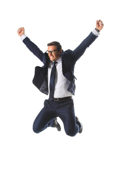 excited businessman in eyeglasses jumping with raised wide arms isolated on white background 