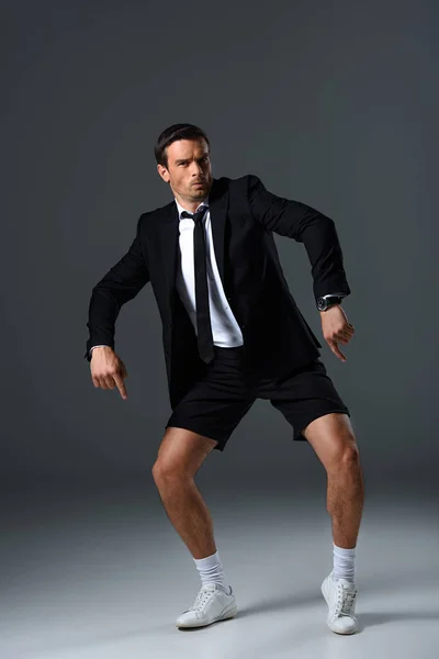 Emotional Stylish Man Shorts Pointing Finger Shorts Grey Background — Stock Photo, Image