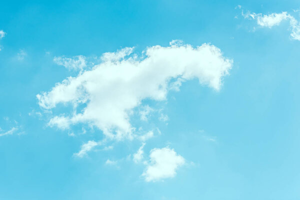 full frame image of bright blue cloudy sky background 