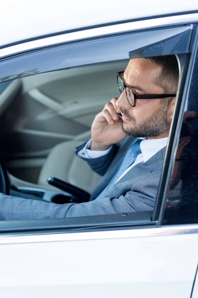 Side View Businessman Eyeglasses Talking Smartphone While Driving Car — Stock Photo, Image