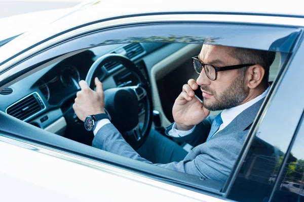 Side View Businessman Eyeglasses Talking Smartphone While Driving Car — Stock Photo, Image