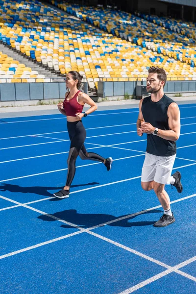 Attractive Young Male Female Joggers Running Track Sports Stadium — Stock Photo, Image