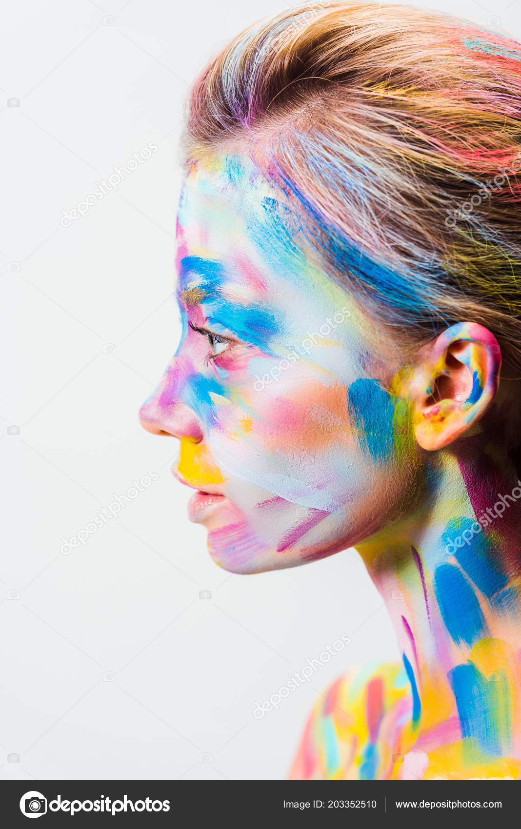 Side view attractive girl colorful bright body art isolated white stock photo