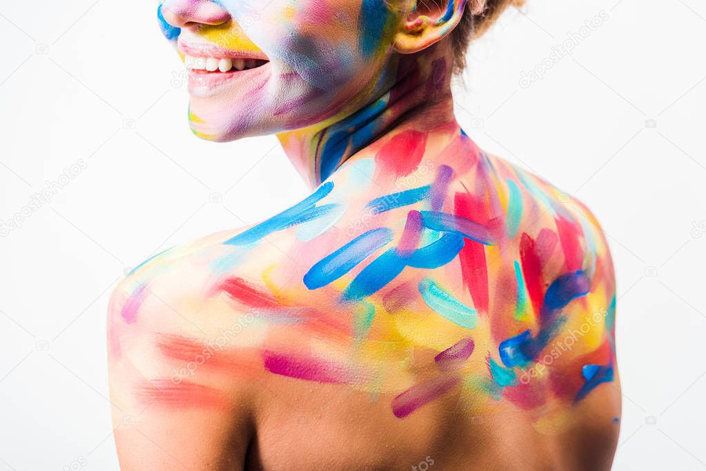 cropped image of smiling girl with colorful bright body art isolated on white 