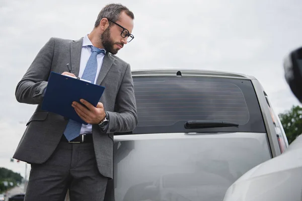 Handsome Businessman Writing Something Car Insurance Car Accident — Stock Photo, Image