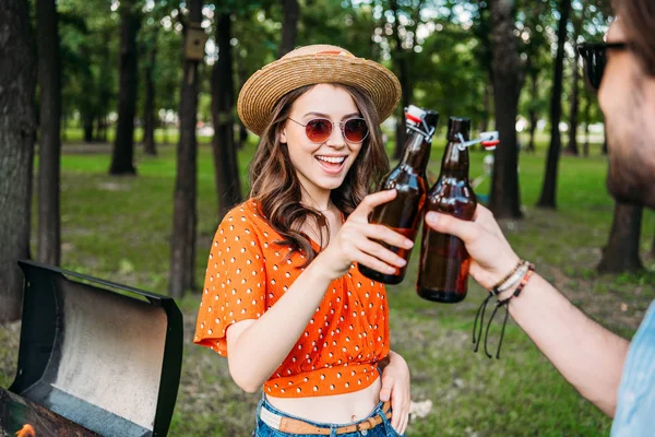 Partial View Couple Clinking Bottles Beer Bbq Park — Stock Photo, Image