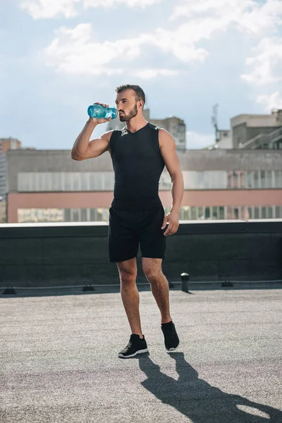 Handsome Sportsman Drinking Water Training Roof — Stock Photo, Image
