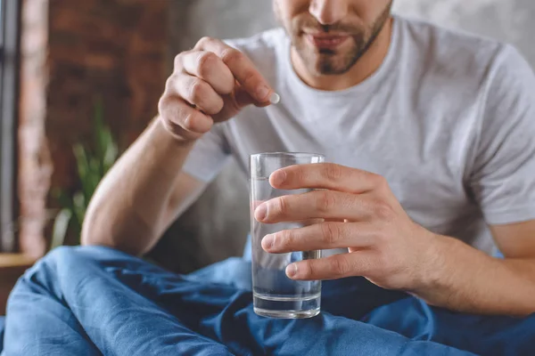 Cropped Image Young Man Hangover Putting Pill Glass Water Bed — Stock Photo, Image