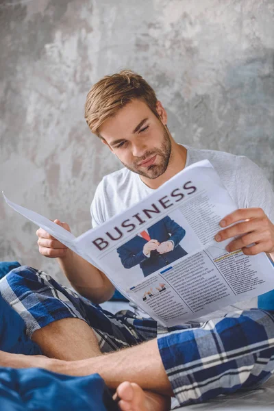 Handsome Young Man Reading Business Newspaper Bed Morning Time Home — Free Stock Photo