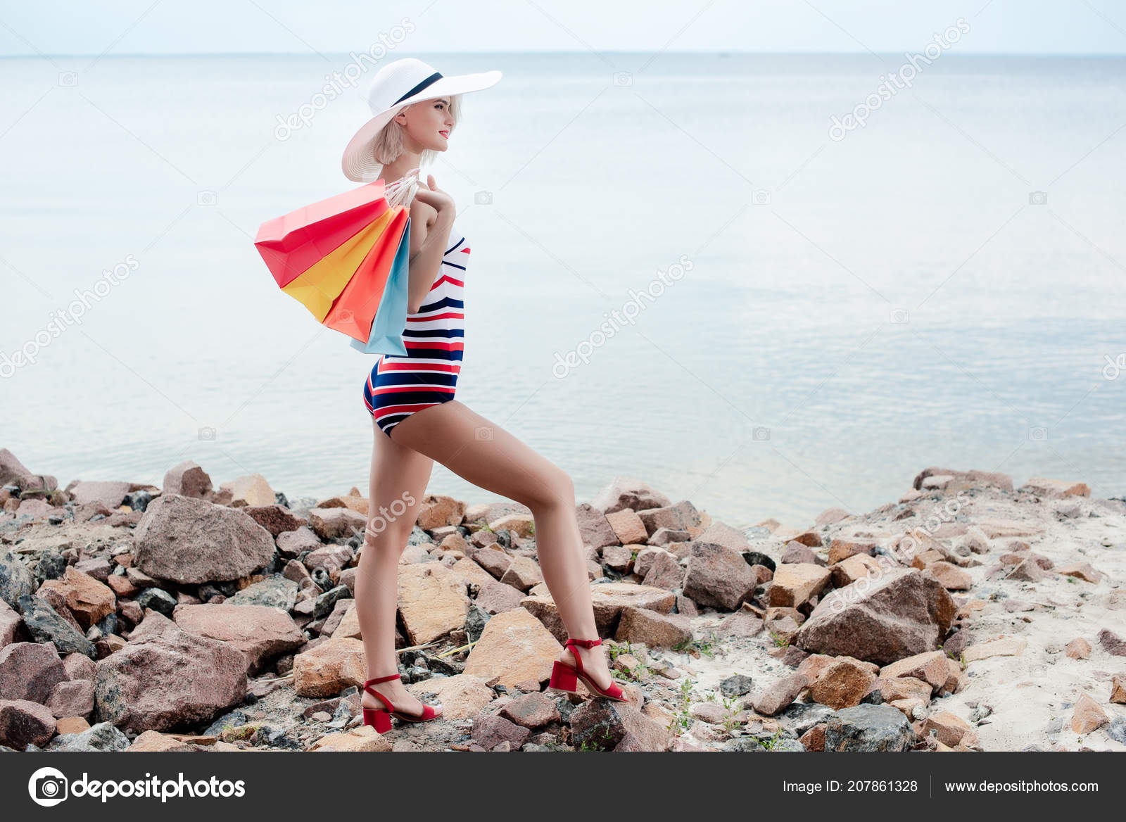 Attractive Woman Striped Vintage Swimsuit Hat Holding Shopping Bags