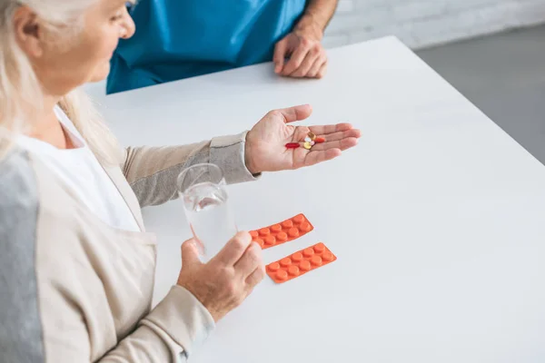 Cropped Shot Sick Senior Woman Holding Pills Glass Water — Stock Photo, Image