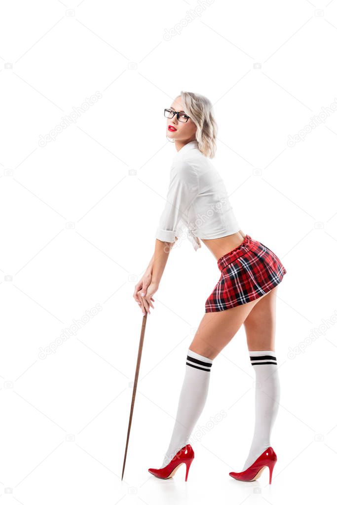 young sexy woman in college uniform with wooden pointer isolated on white