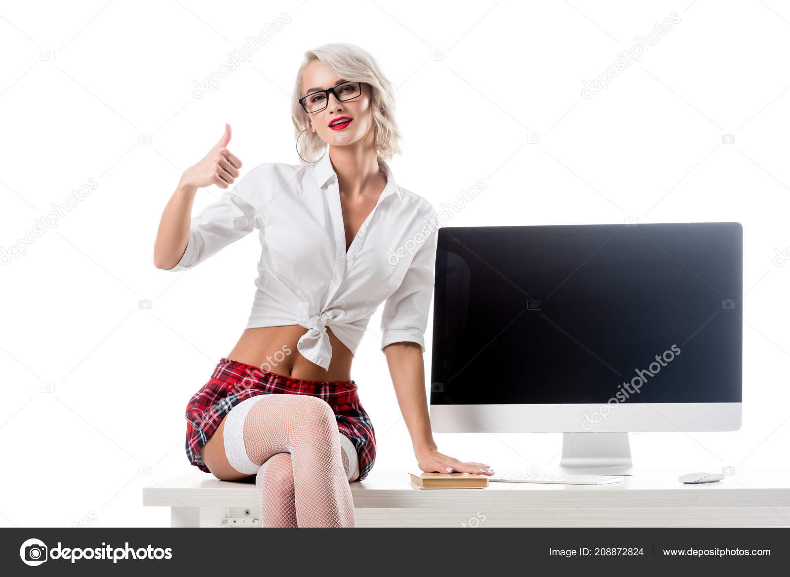 Seductive Schoolgirl Short Plaid Skirt Showing Thumb While Sitting Table Stock Photo Seductive Schoolgirl Short Plaid Skirt Showing Thumb While Sitting Table Stock Photo