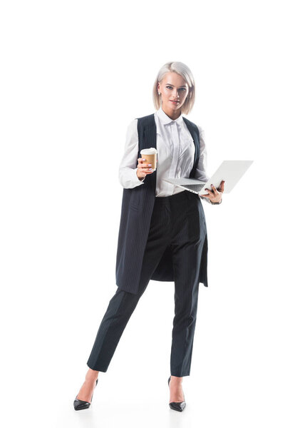 young businesswoman with coffee to go and laptop isolated on white