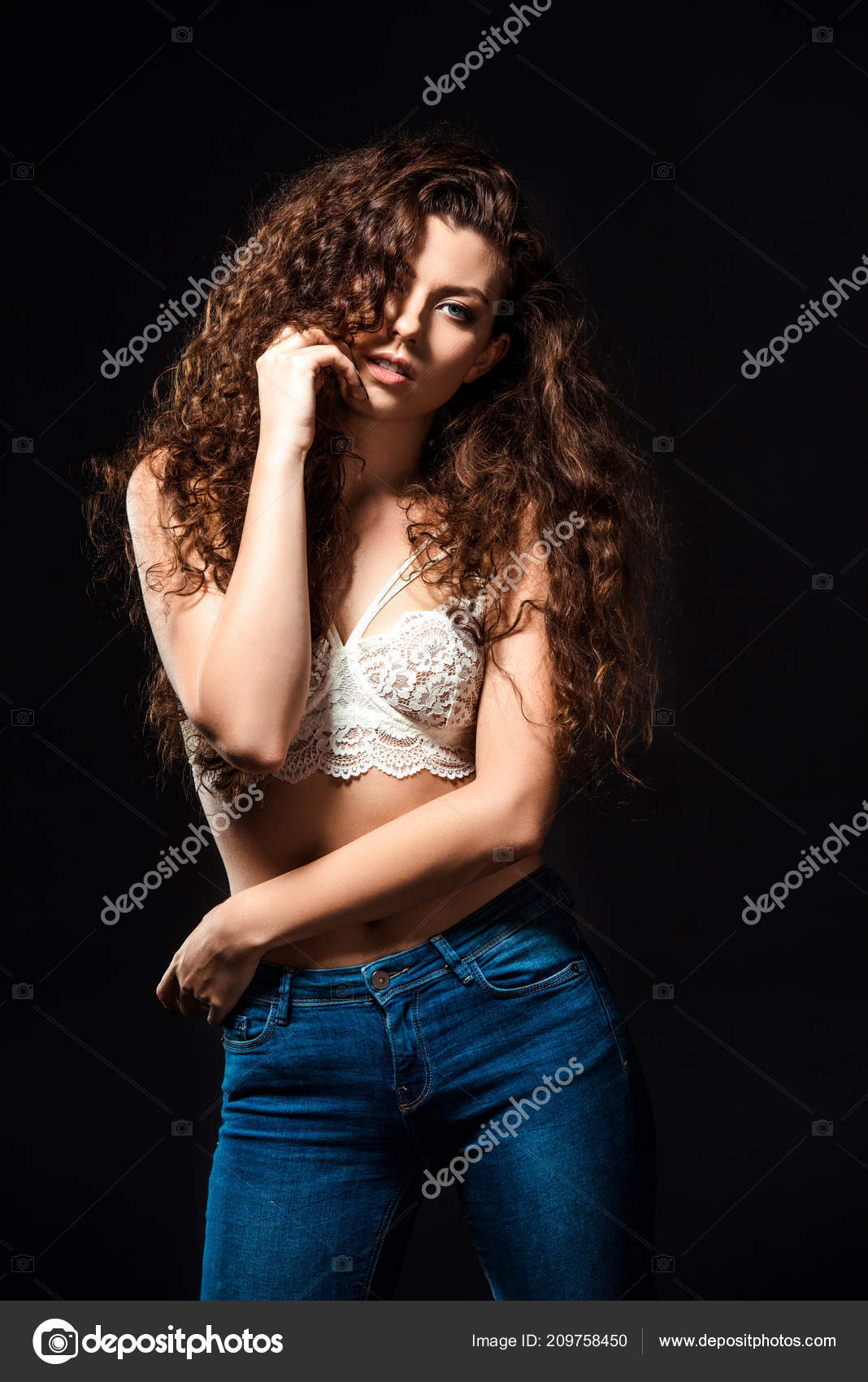 Portrait Beautiful Woman White Bra Jeans Posing Isolated Black Stock Photo  by ©VitalikRadko 209758450
