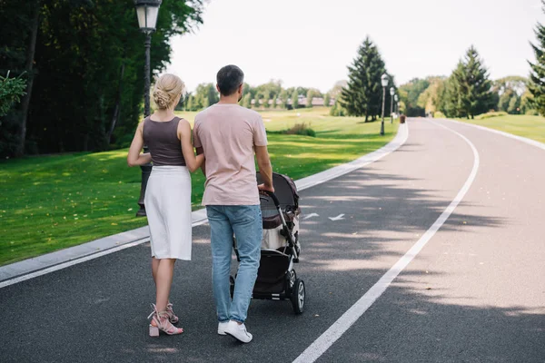 Back View Parents Walking Baby Carriage Road Park — Stock Photo, Image