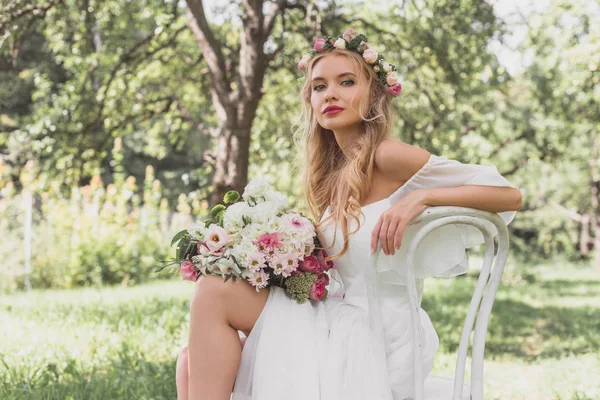 Beautiful Young Blonde Bride Wedding Dress Sitting Chair Looking Camera — Stock Photo, Image