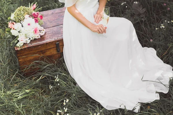 High Angle View Bride Holding Glass Champagne Sitting Vintage Chest — Stock Photo, Image