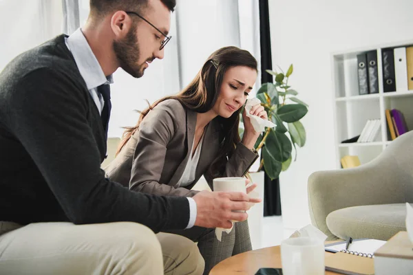 Psychologist Giving Cup Tea Crying Patient Doctors Office — Stock Photo, Image