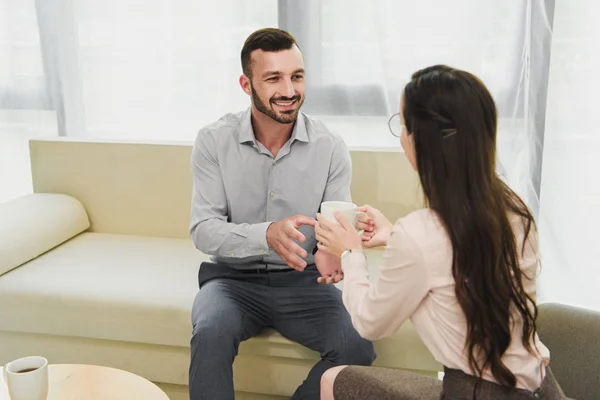 Psychologist Giving Cup Coffee Happy Patient Office — Stock Photo, Image