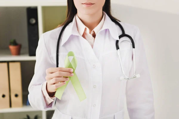 Cropped View Doctor White Coat Stethoscope Holding Green Ribbon Mental — Stock Photo, Image