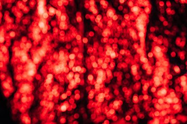 beautiful defocused red bokeh lights, abstract background  clipart