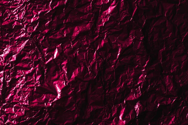 美しい光沢のある抽象しわくちゃ紫箔の背景 — ストック写真