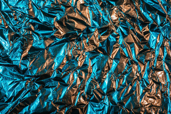 beautiful shiny abstract crumpled silver foil background