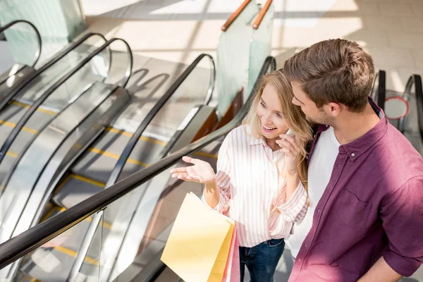 High Angle View Woman Shopping Bags Talking Smartphone While Her — Free Stock Photo