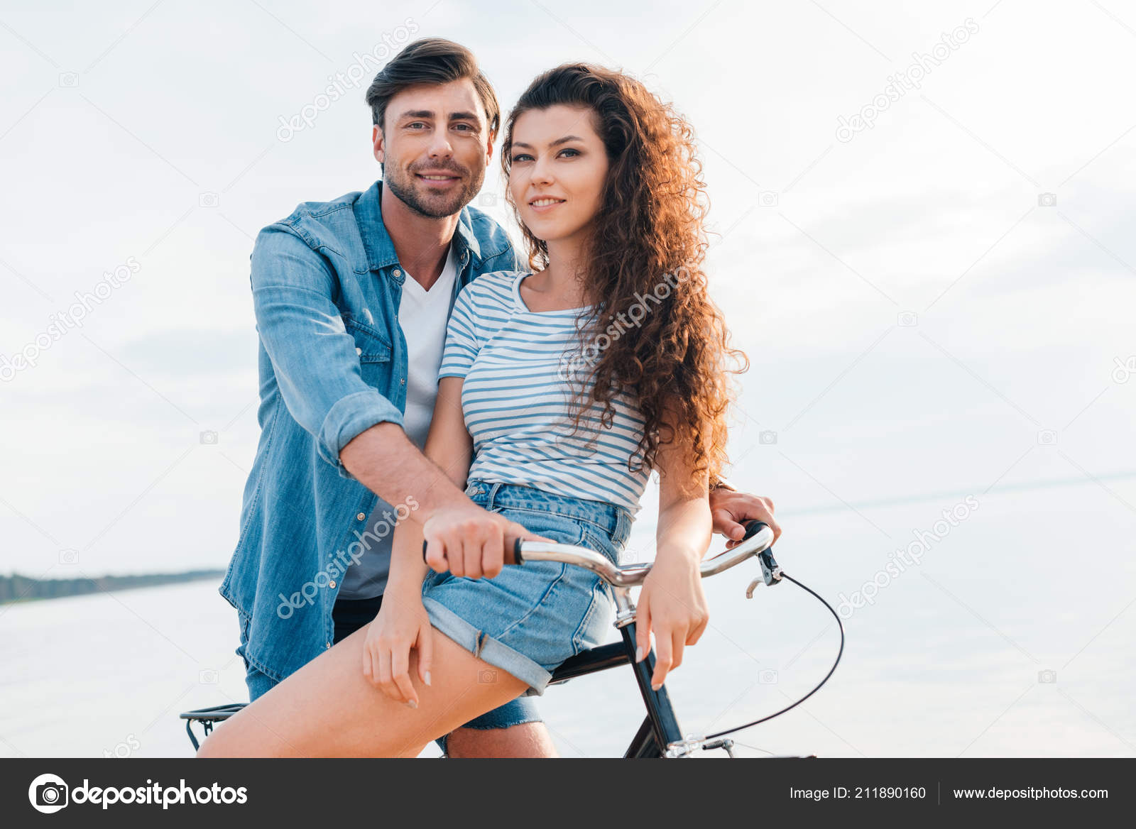 Couple Sitting Bicycle Young Couple Sitting On A Bicycle Opposite