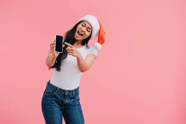 Portrait Happy African American Woman Santa Claus Hat Pointing Smartphone — Stock Photo, Image