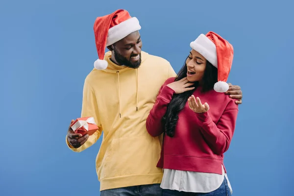 Smiling African American Man Christmas Hat Gifting Present Box Girlfriend — Stock Photo, Image